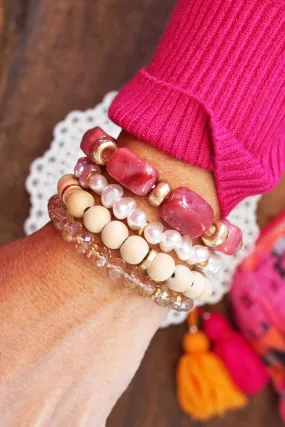 Bracelet Stack of 4 pieces red and neutrals acrylic pearls glass and wood beads